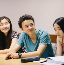 Participants sit in class. 